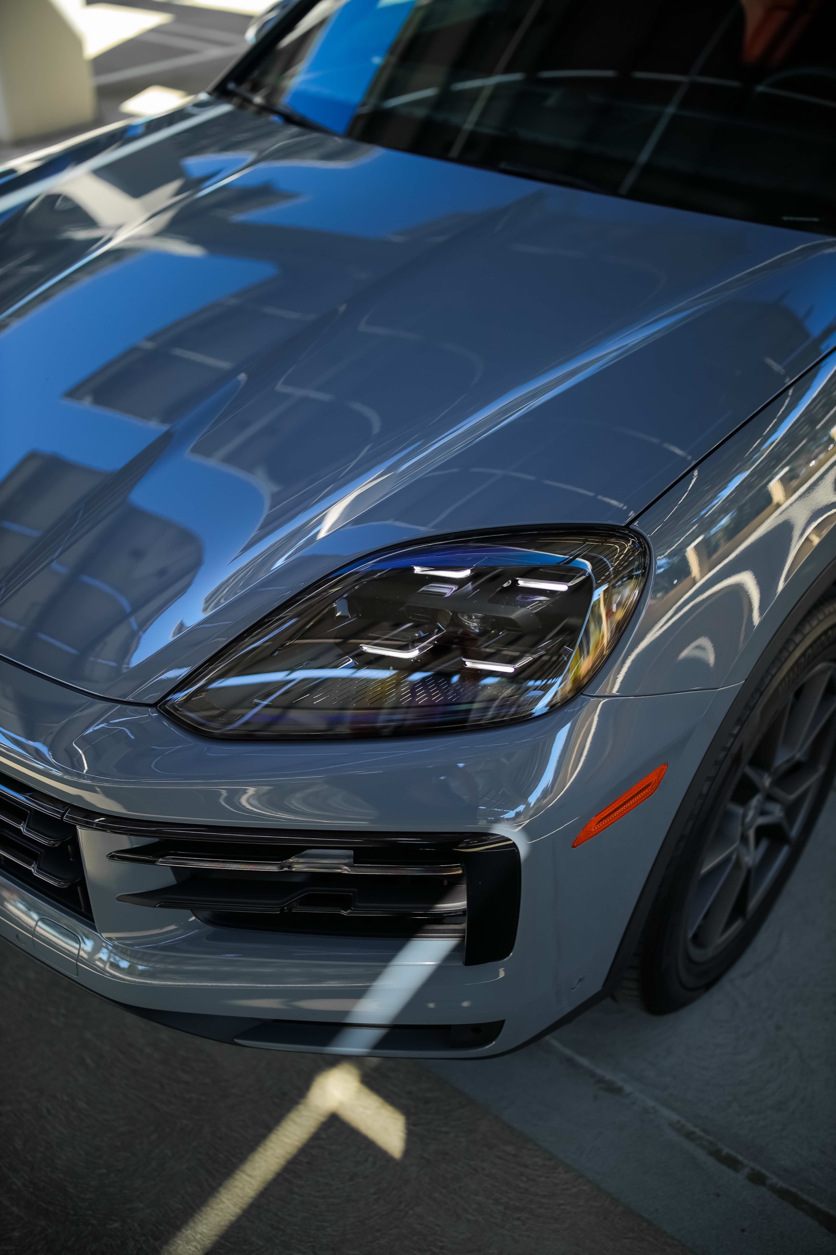 Porsche Cayenne LED headlight and grey front fender
