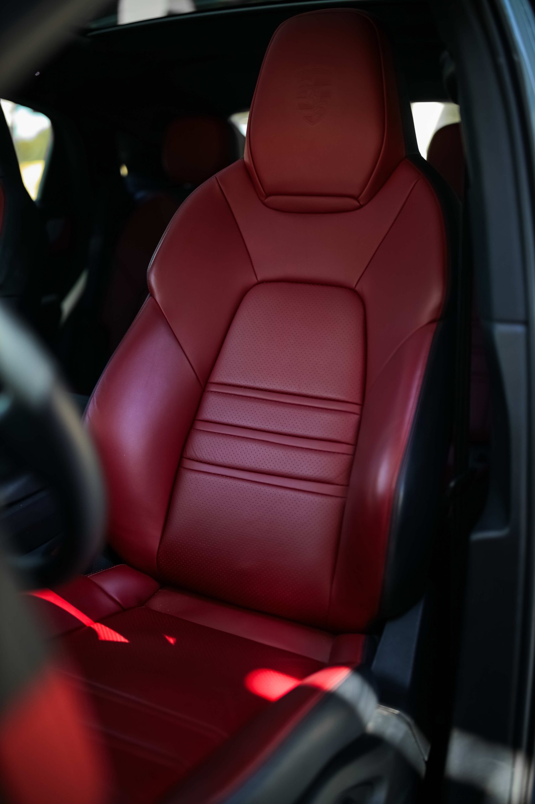 Red leather front seat in the Porsche Cayenne
