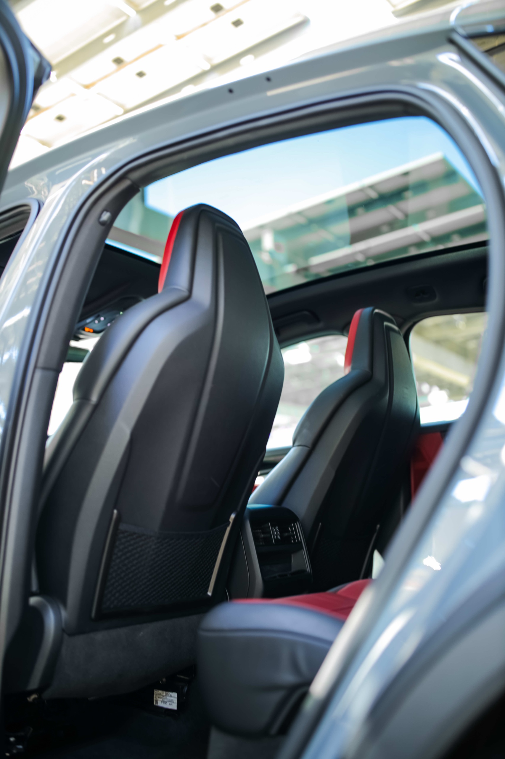Porsche Cayenne panoramic glass roof above the red and black cabin