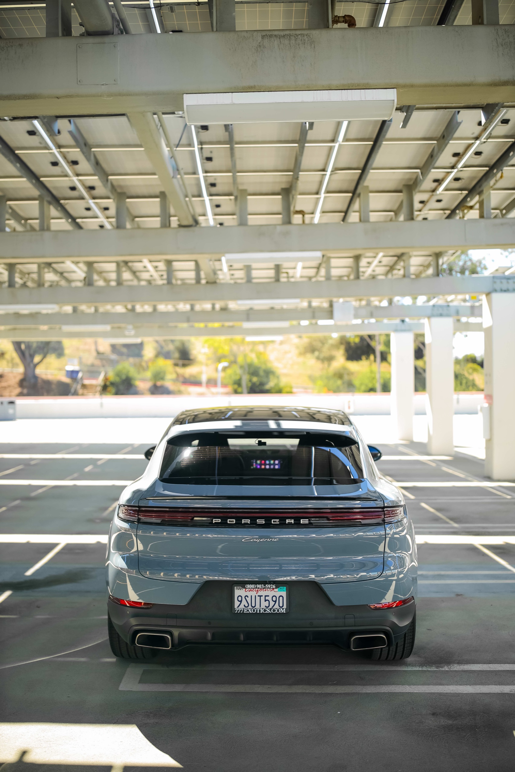 Portrait rear view of the Nardo Grey Porsche Cayenne