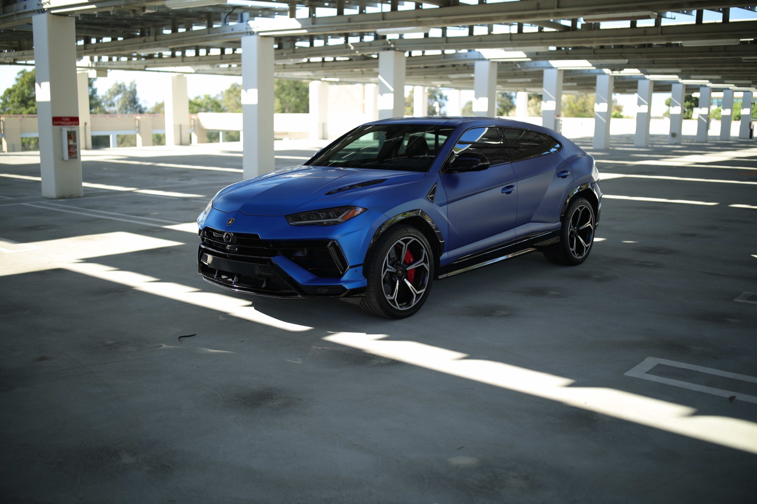 Frozen Blue Lamborghini Urus S front three-quarter exterior view