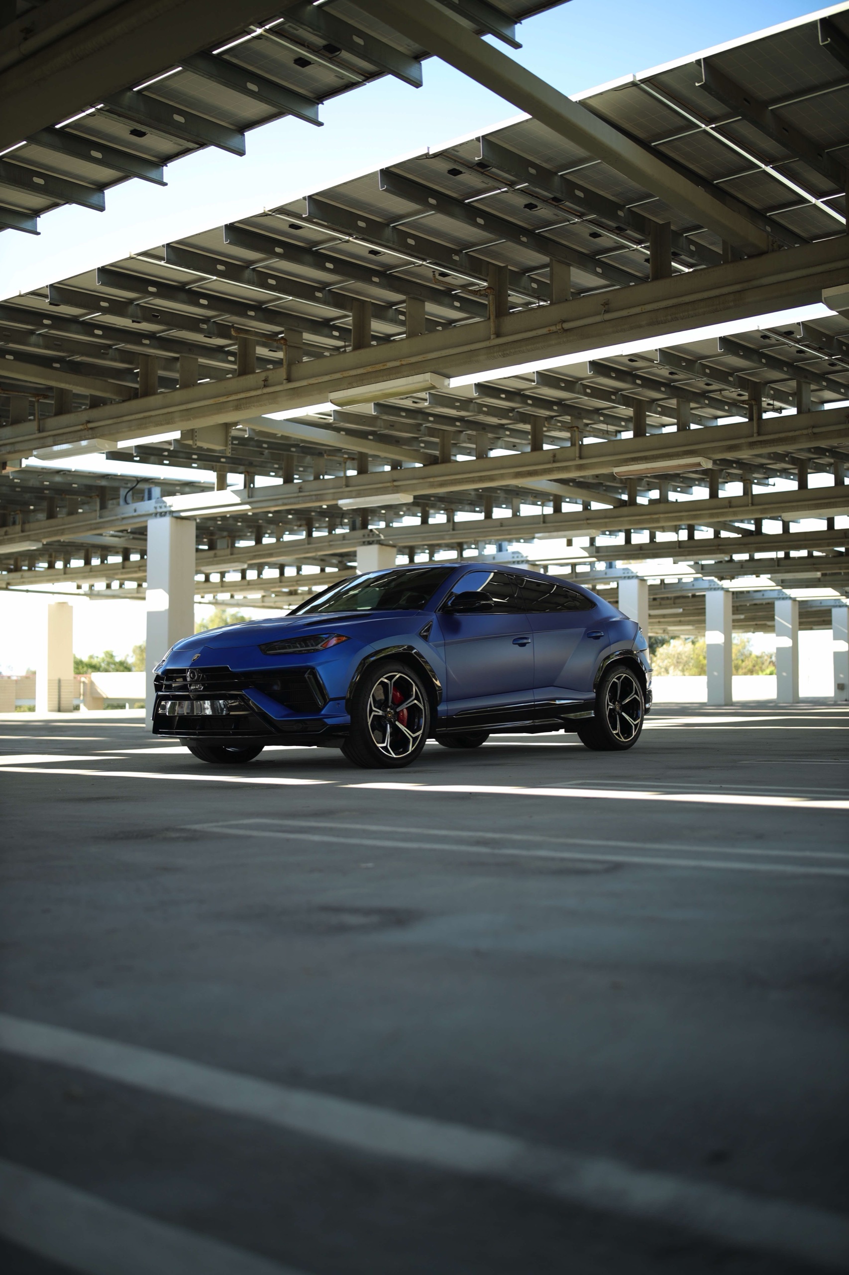 Low exterior view of the Frozen Blue Lamborghini Urus S