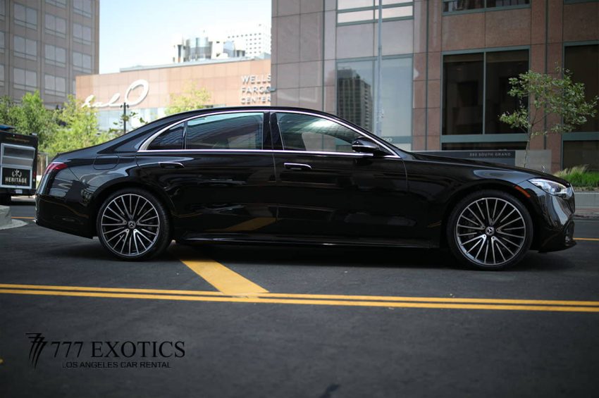 side view of black mercedes benz s580