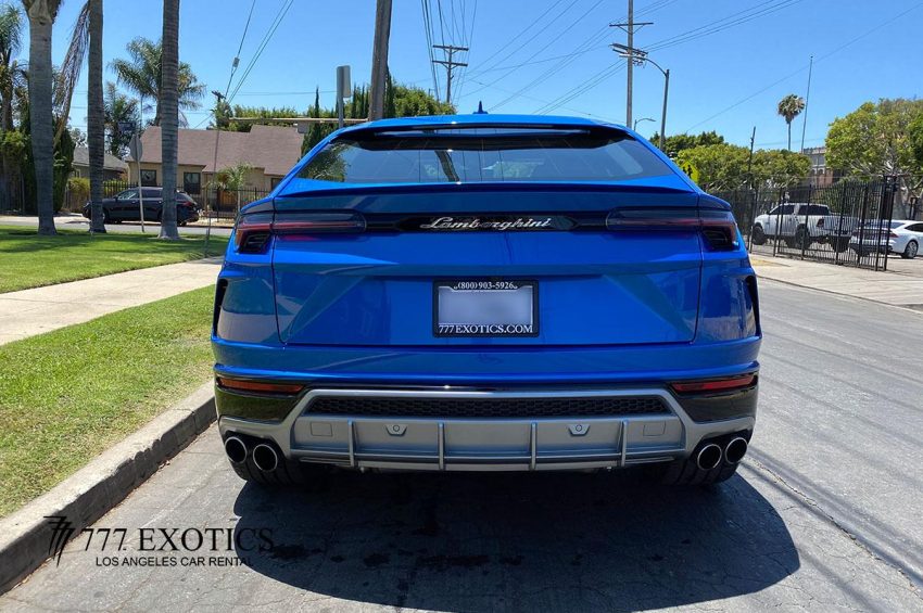 rear view of blue lamborghini urus