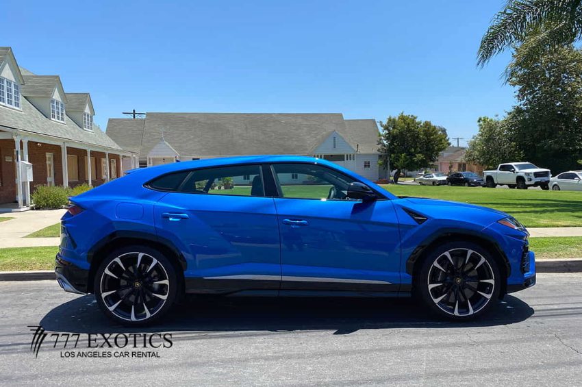 side view of blue lamborghini urus